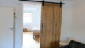 Objekt 18865 Wohnzimmer mit Blick zum Schlafzimmer